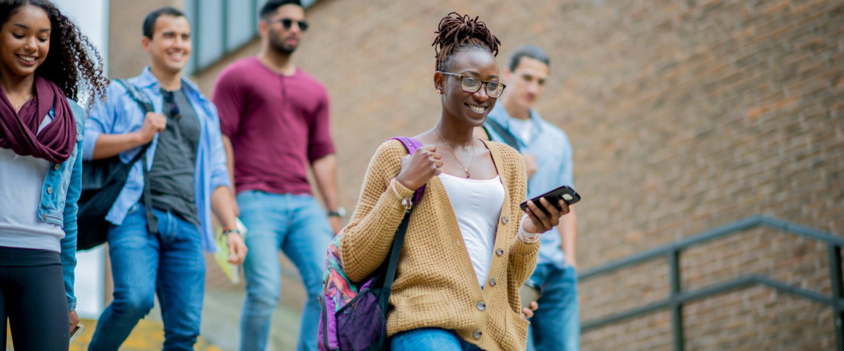 Students walking down stairs